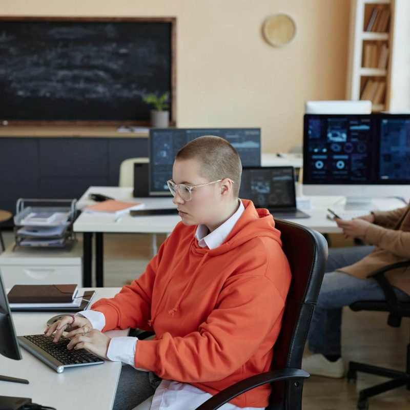 side-view-of-young-busy-female-specialist-in-cyber-security-networking.jpg